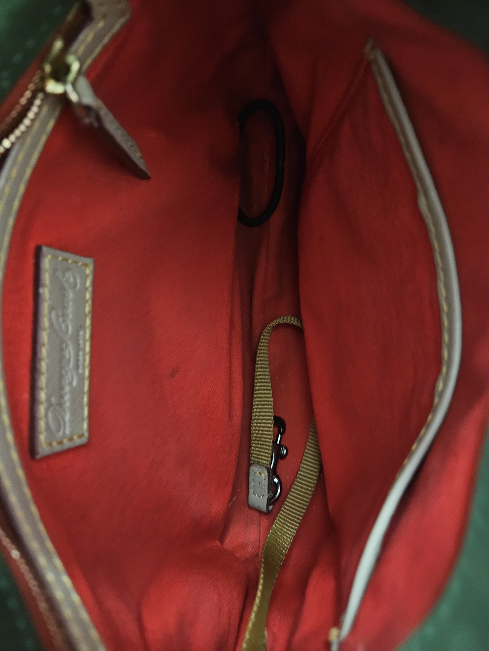 Dooney & Bourke Florentine Allison Crossbody bag is featured in a light taupe - Picture 6 of 6